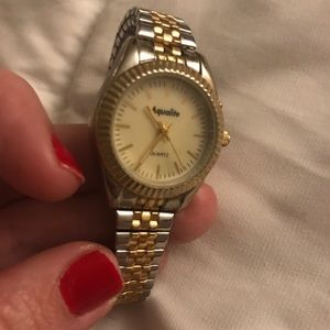 Beautiful stainless steel and gold watch